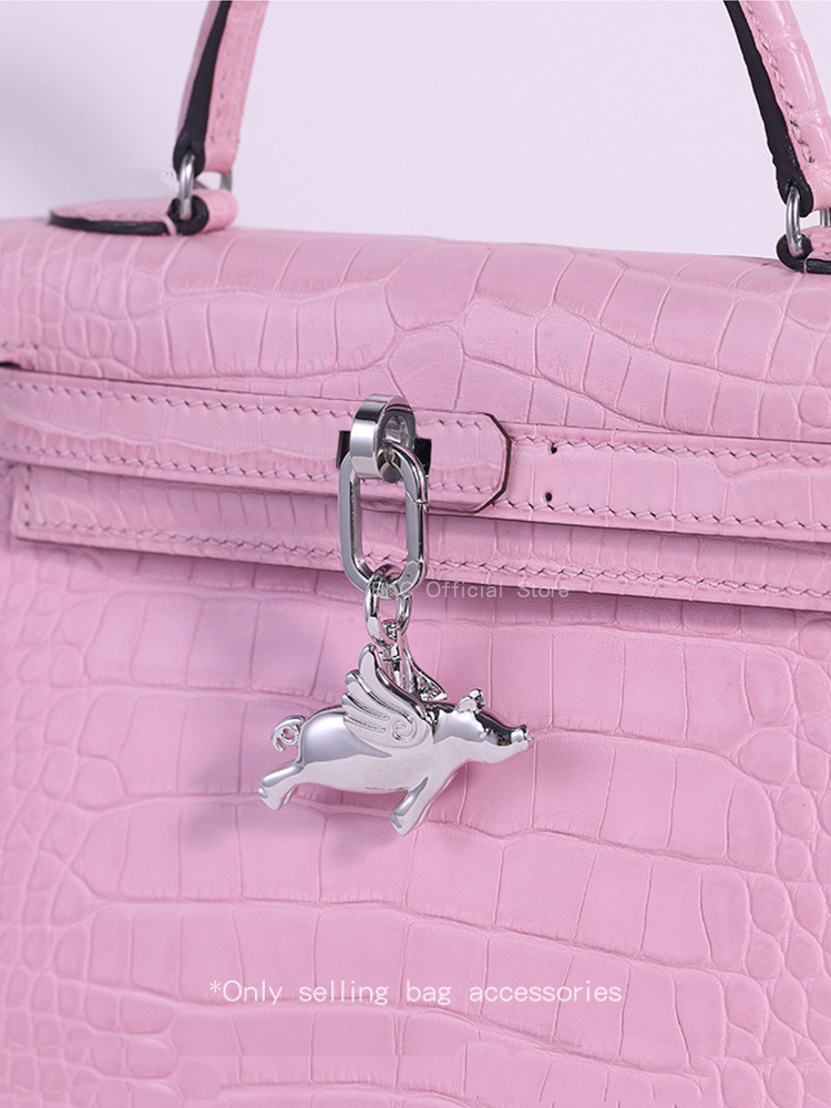 Luxury Brass Fliggy Bag Charm  - огляд і ціна Luxury Bags Hermes