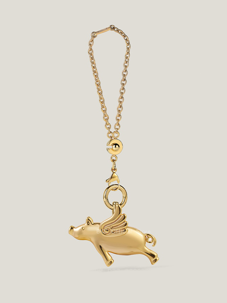 Luxury Brass Fliggy Bag Charm  - огляд і ціна Luxury Bags Hermes