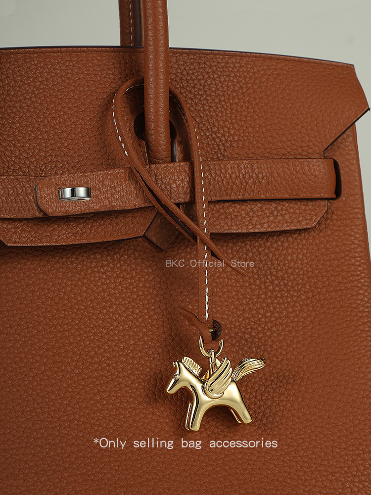 Luxury Brass Pegasus Bag Charm - огляд і ціна Luxury Bags Hermes